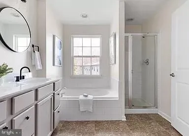a bath room with a sink and a mirror