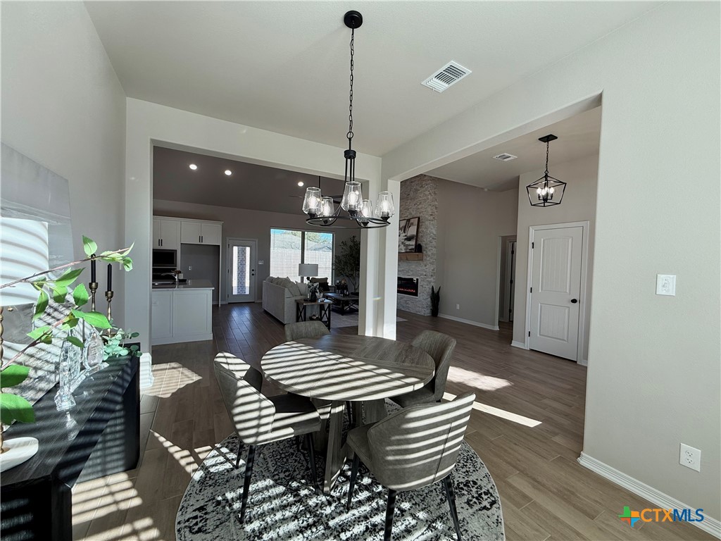 203 Lasso Loop Lorena, TX 76655 - Photo 6 of 37 a view of a dining room with furniture