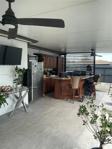 a room with furniture and a flat screen tv