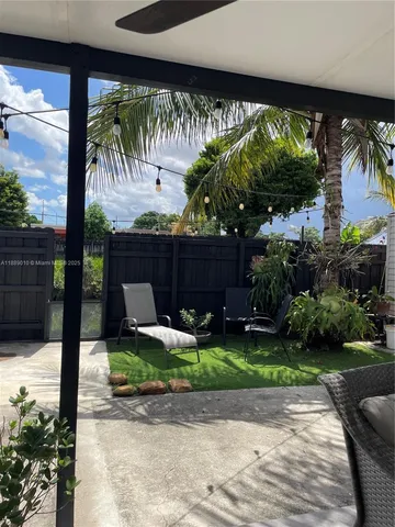 a view of a bench in a patio
