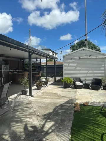 a view of a building with a patio