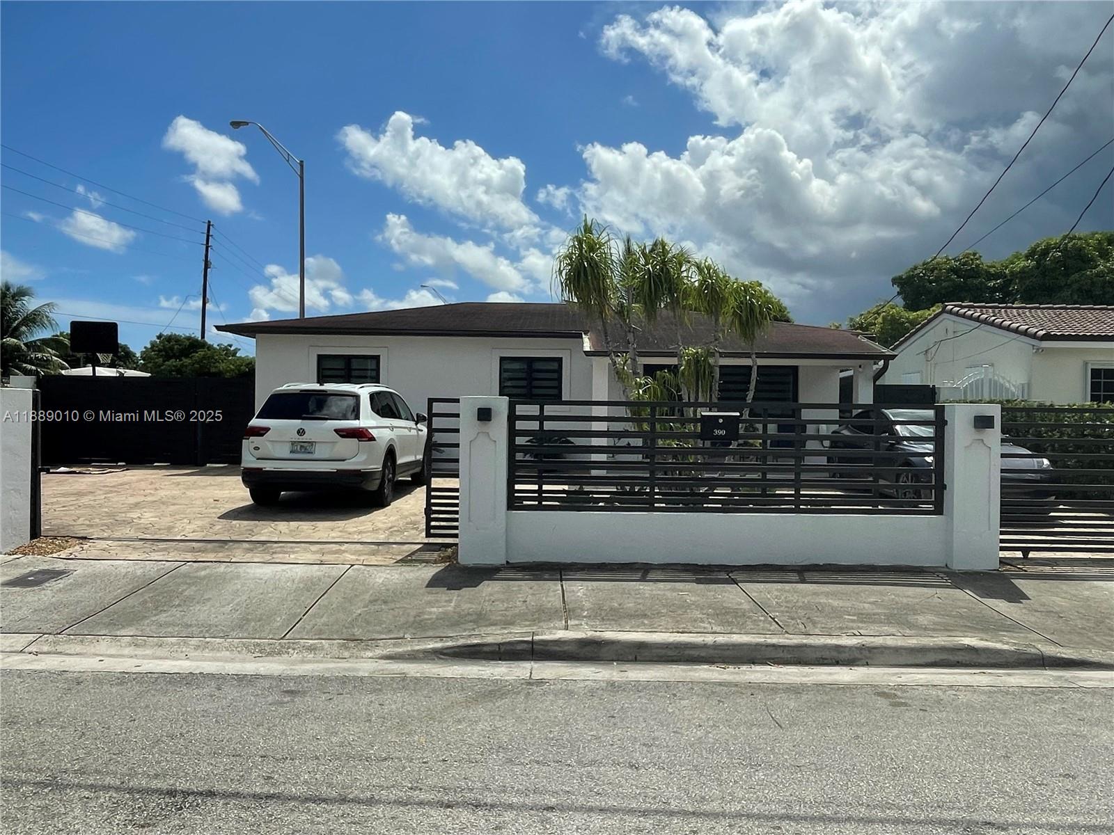 390 East 53rd Street Hialeah, FL 33013 - Photo 2 of 21 a view of a house with a patio