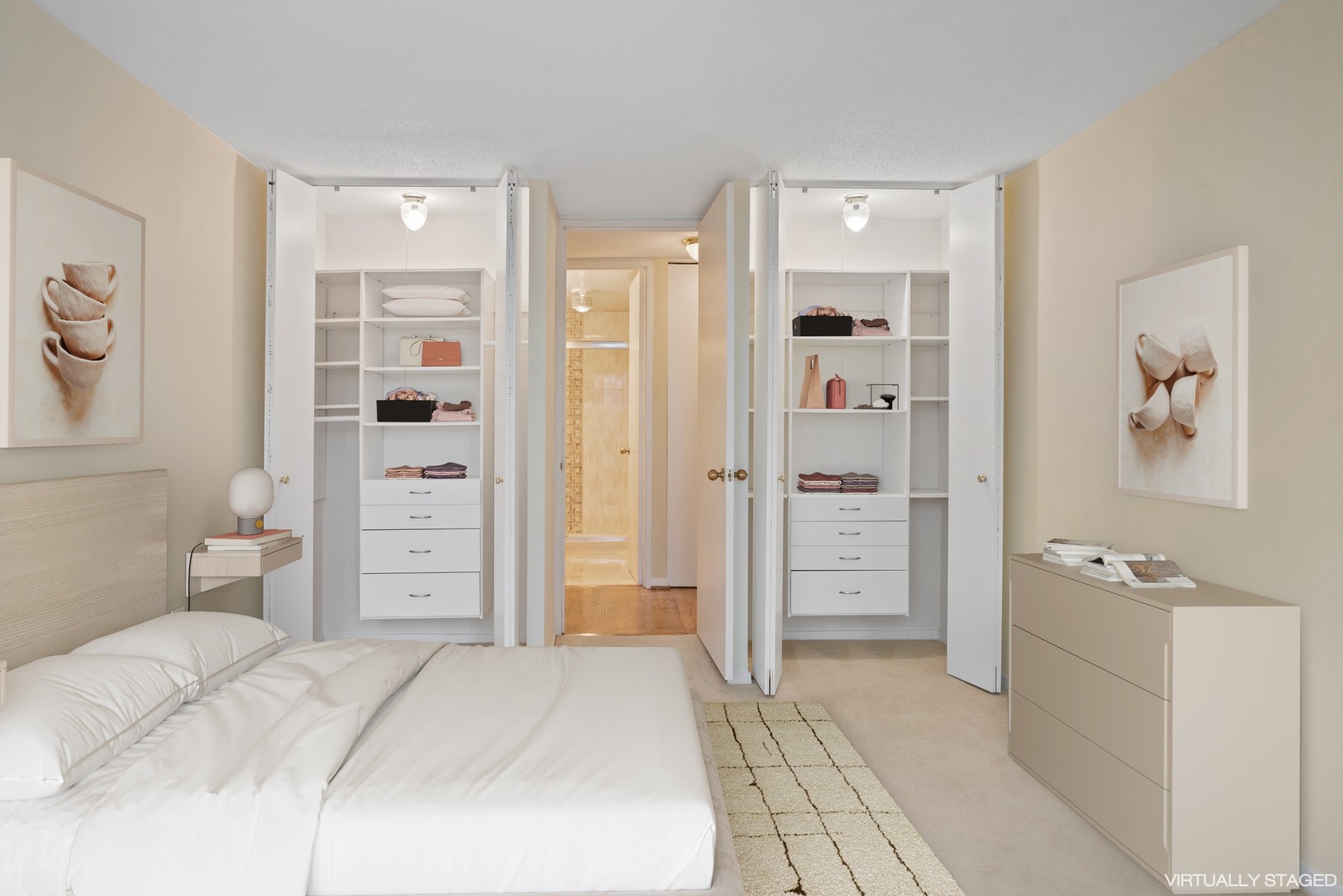 360 East Randolph Street, Unit 707 Chicago, IL 60601 - Photo 13 of 20 a bedroom with a bed and a view of bathroom