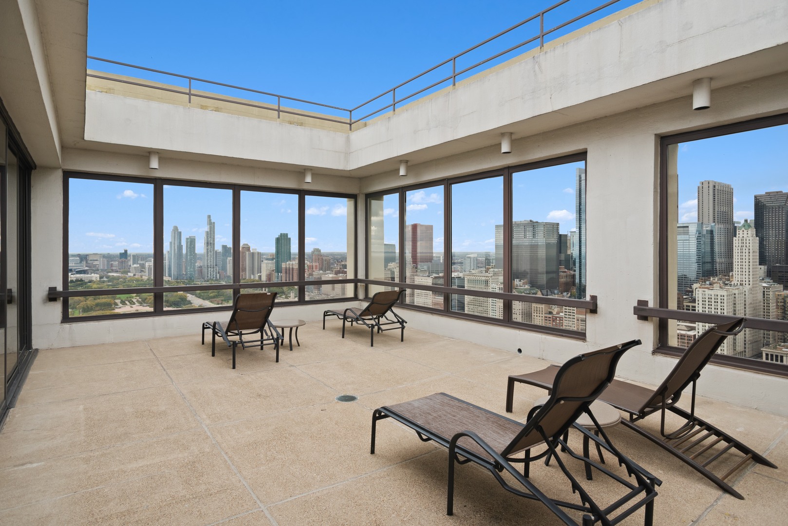 360 East Randolph Street, Unit 707 Chicago, IL 60601 - Photo 17 of 20 a living room with furniture and a large window