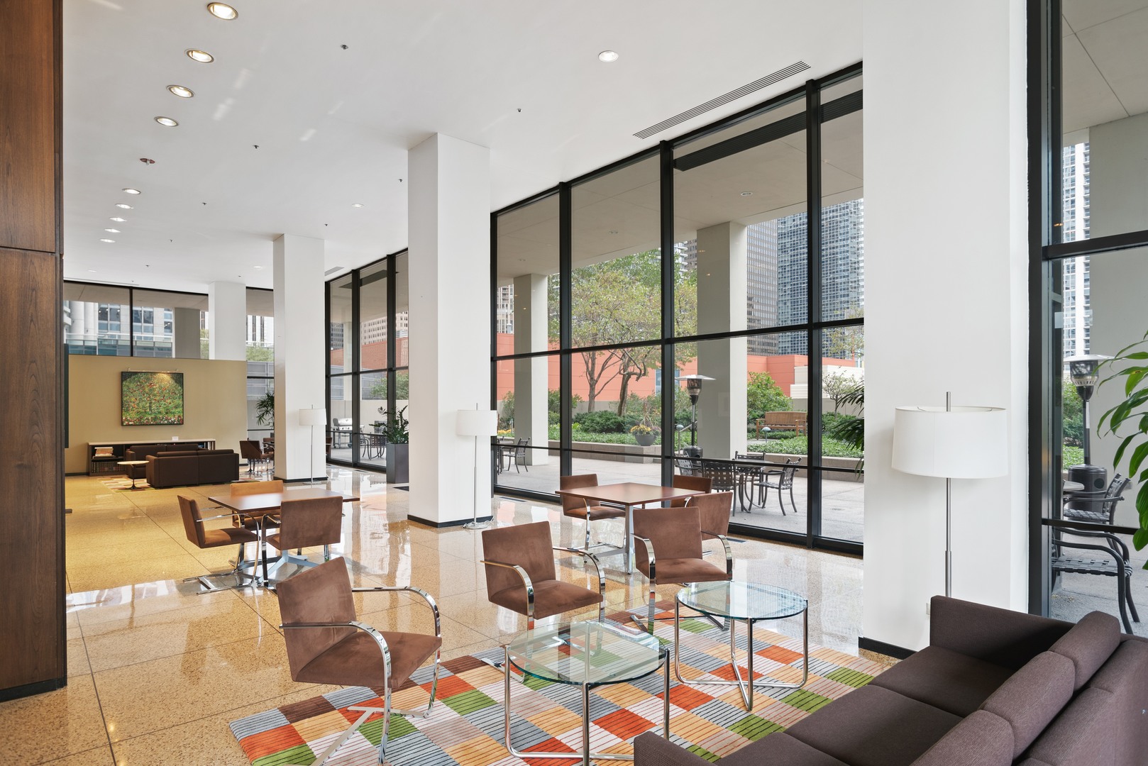 360 East Randolph Street, Unit 707 Chicago, IL 60601 - Photo 19 of 20 a living room with furniture and floor to ceiling window