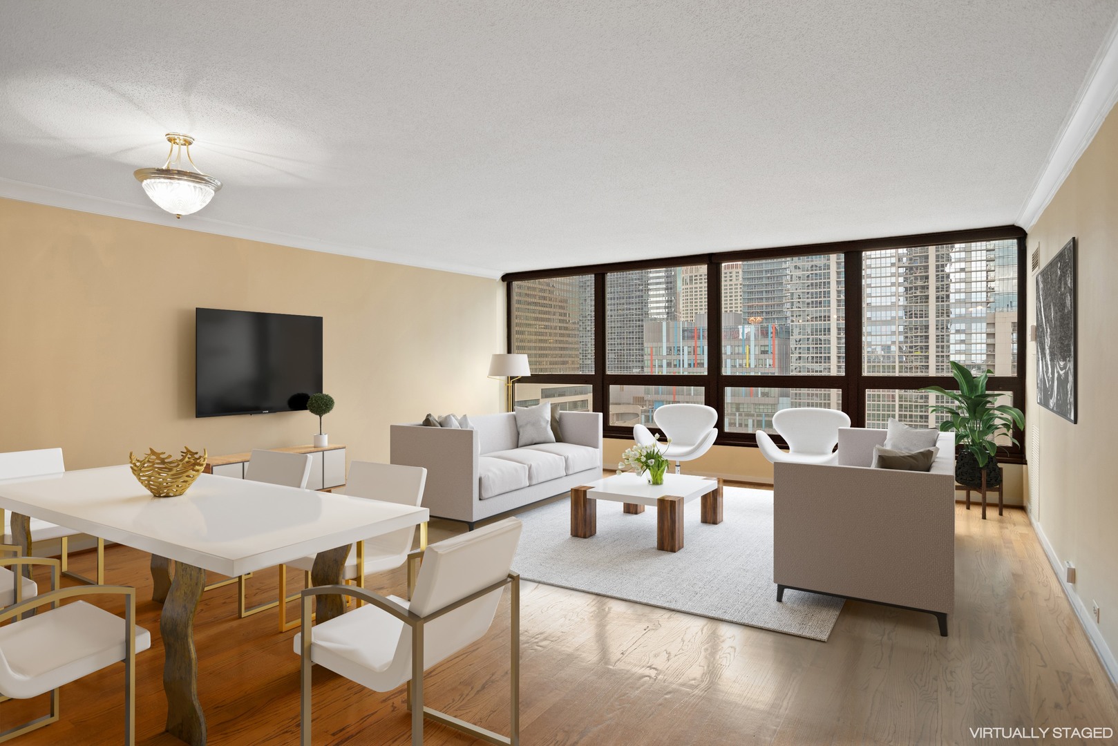 360 East Randolph Street, Unit 707 Chicago, IL 60601 - Photo 3 of 20 a living room with furniture and a flat screen tv
