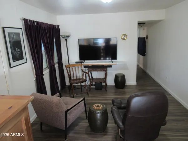 a bedroom with a bed and a closet