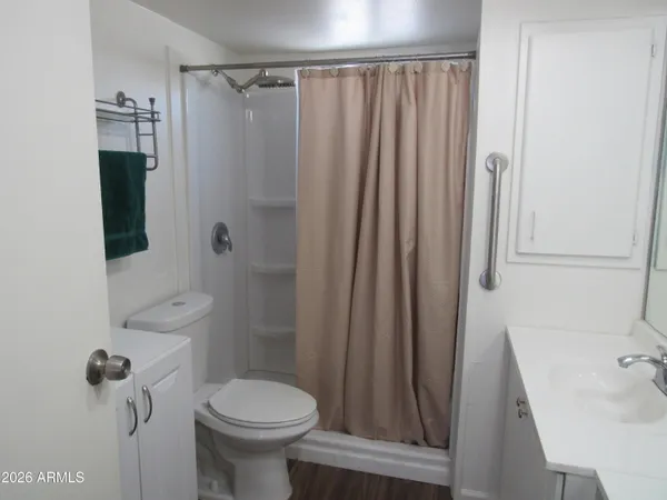 a view of a backyard house and swimming pool