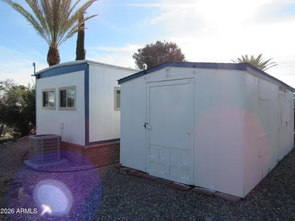 a kitchen with a refrigerator and countertop