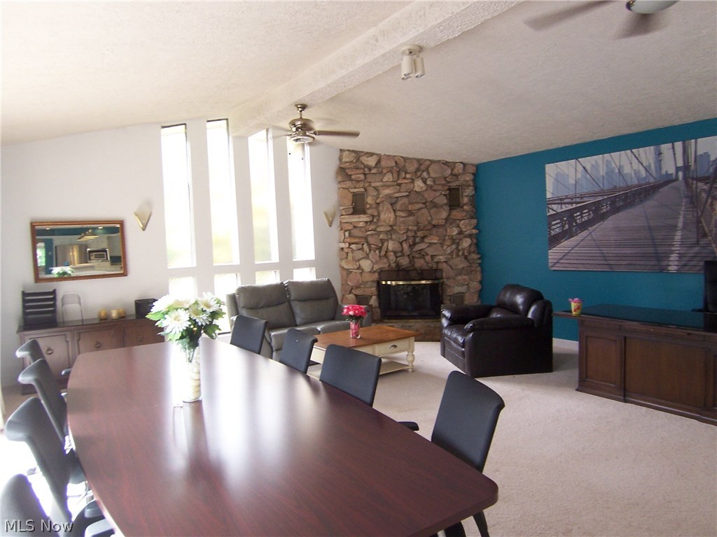 122 Rector Road Parkersburg, WV 26104 - Photo 8 of 35 Here is the 21 x 24 familyroom with cathedral ceiling, stone face gas fireplace and lots of natural lighting. New carpet.