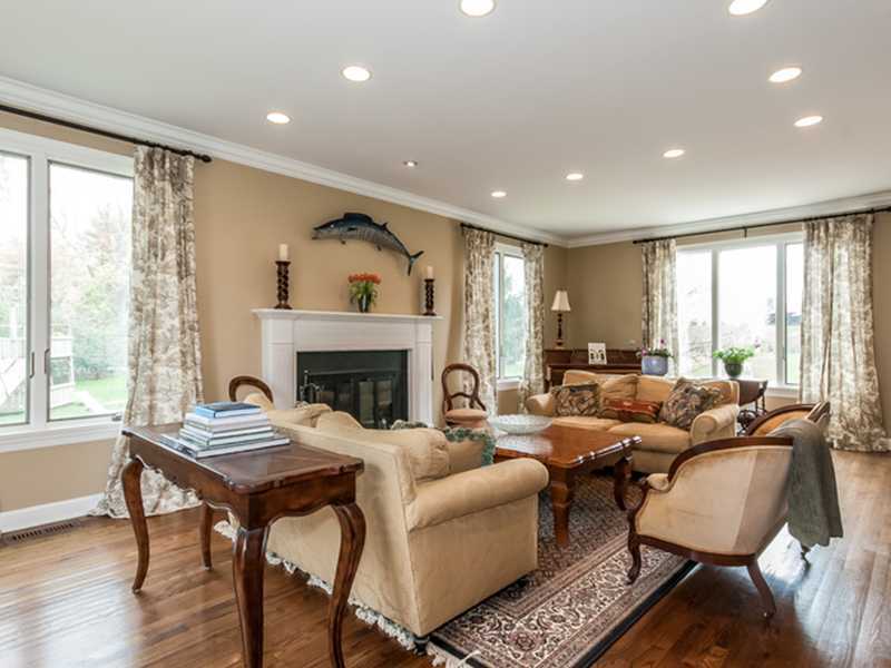 45 Cedar Cliff Road Riverside, CT 06878 - Photo 4 of 24 a living room with furniture and a fireplace