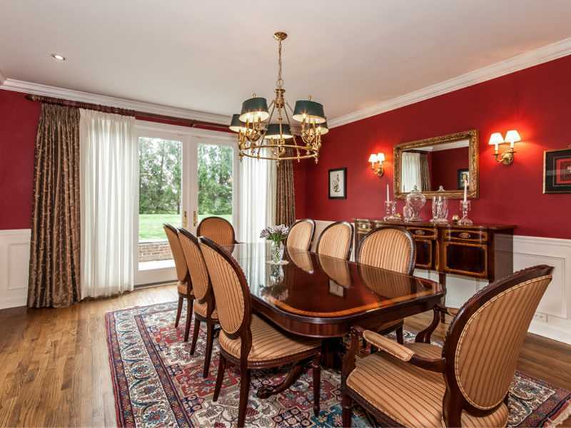 45 Cedar Cliff Road Riverside, CT 06878 - Photo 5 of 24 a dining room with furniture a chandelier and wooden floor