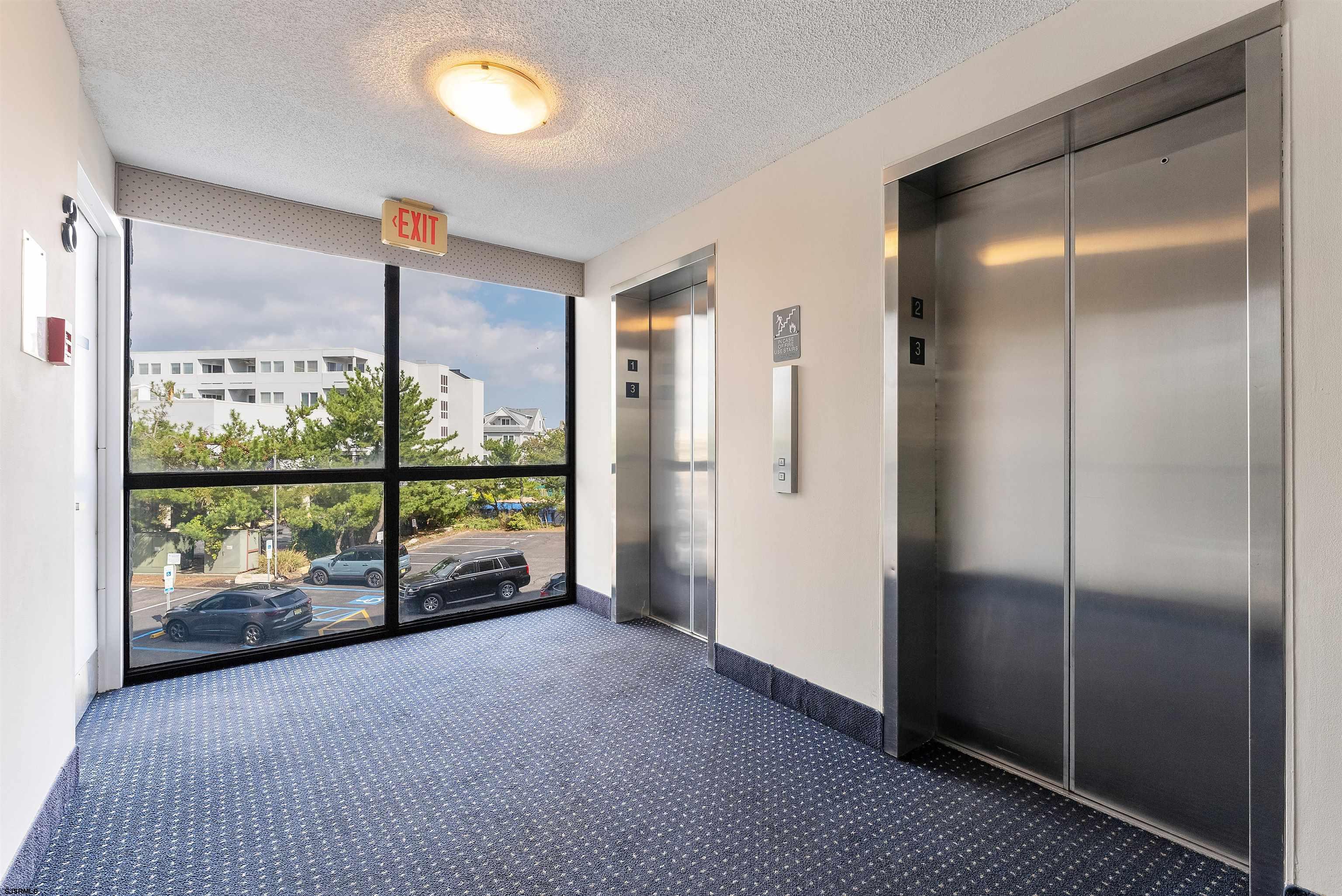 935 Ocean Avenue, Unit 319 Ocean City, NJ 08226 - Photo 23 of 24 a view of empty room with floor to ceiling window