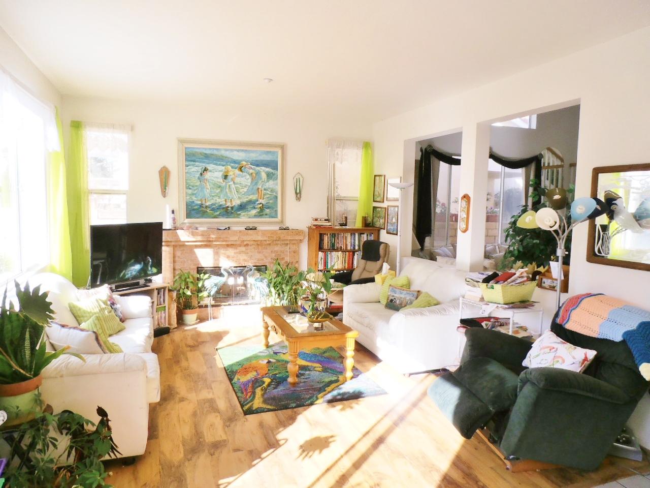 2307 Mint Way Oxnard, CA 93036 - Photo 11 of 39 a living room with furniture large window and flat screen tv