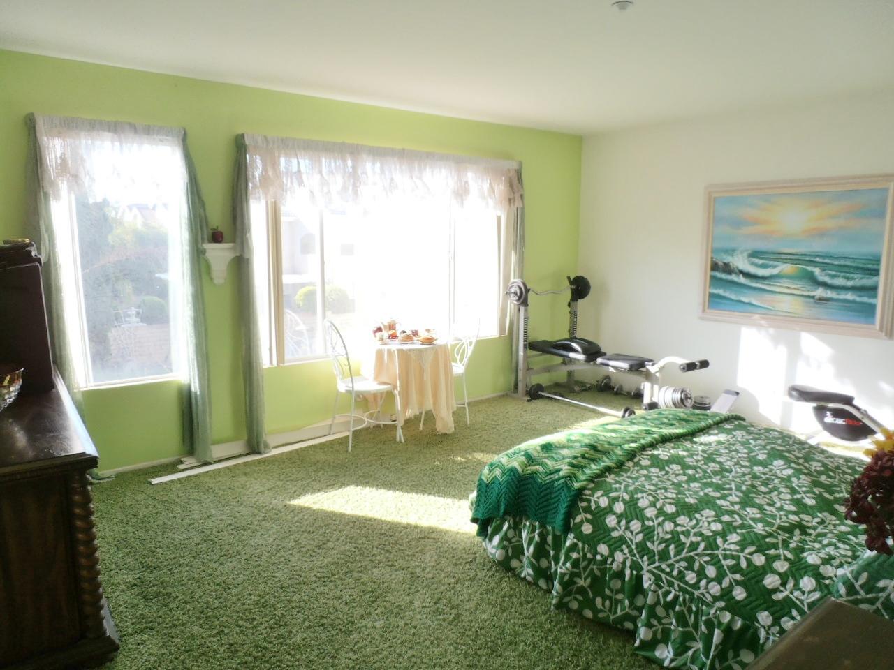 2307 Mint Way Oxnard, CA 93036 - Photo 22 of 39 a living room with furniture and a large window
