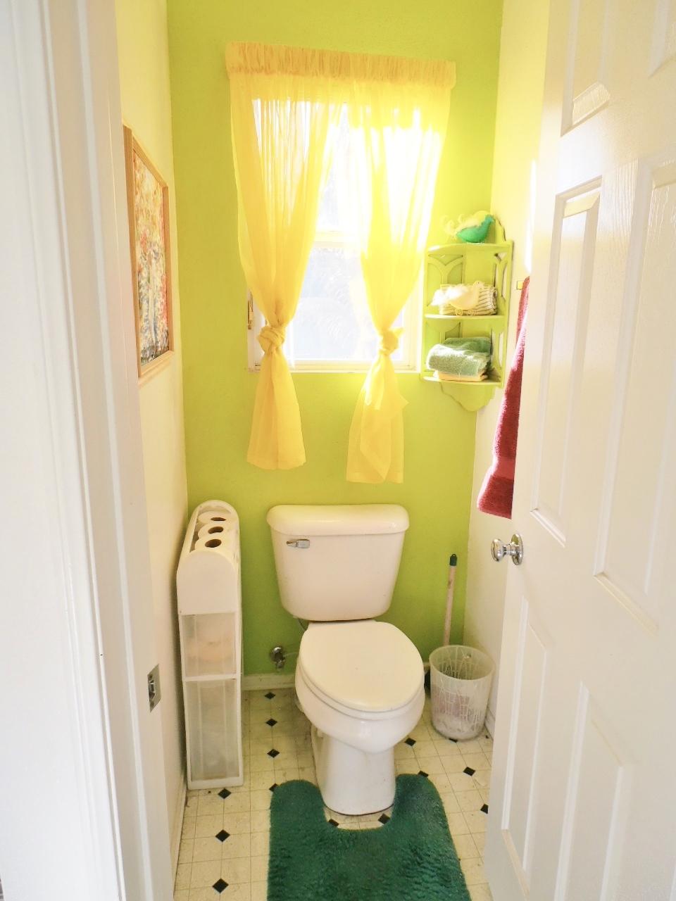 2307 Mint Way Oxnard, CA 93036 - Photo 27 of 39 a bathroom with a toilet and a shower