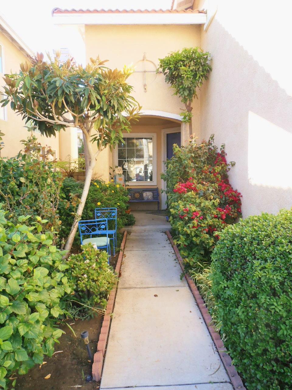 2307 Mint Way Oxnard, CA 93036 - Photo 3 of 39 a view of house with garden