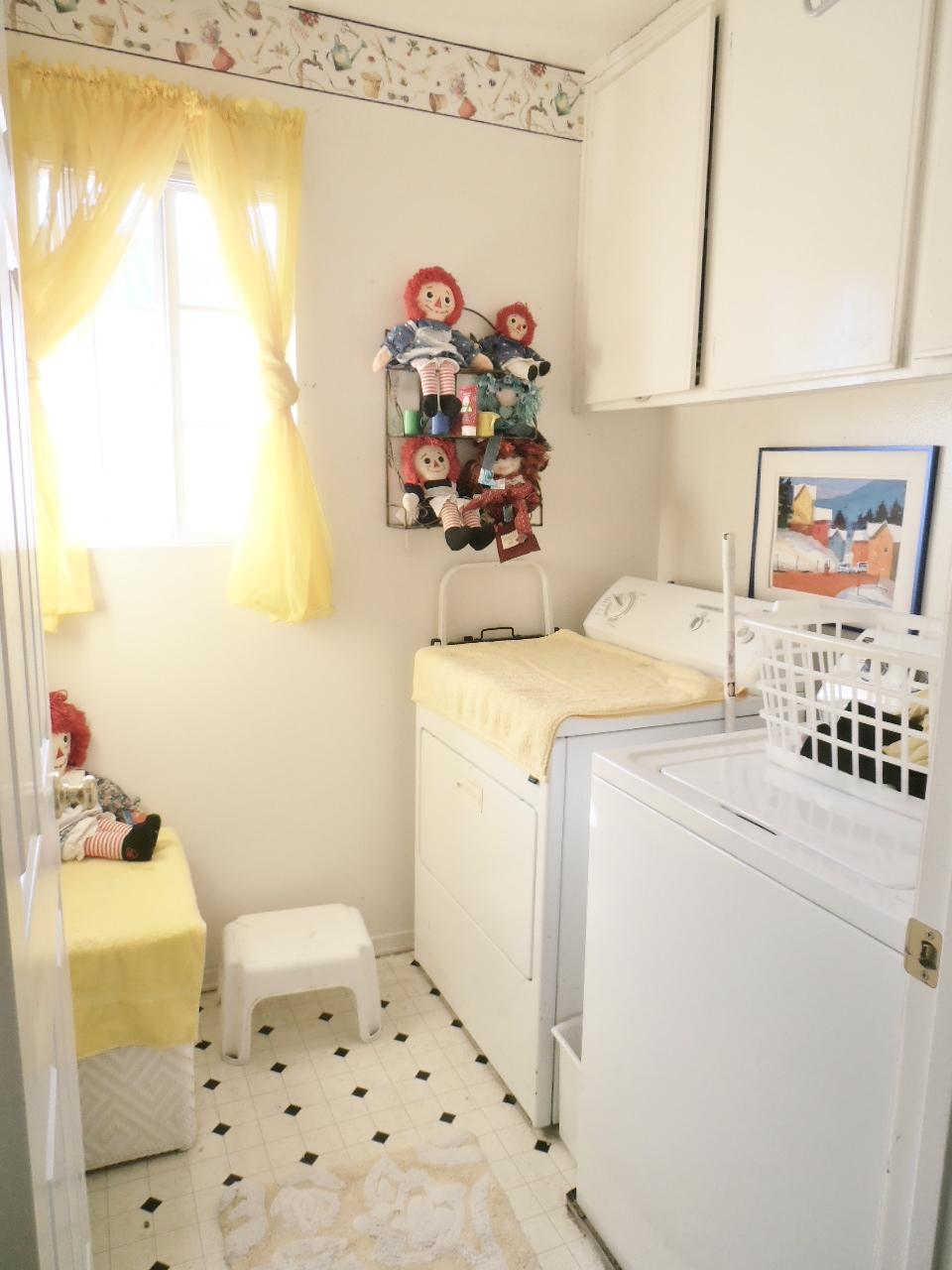2307 Mint Way Oxnard, CA 93036 - Photo 33 of 39 a utility room with a window washer and dryer