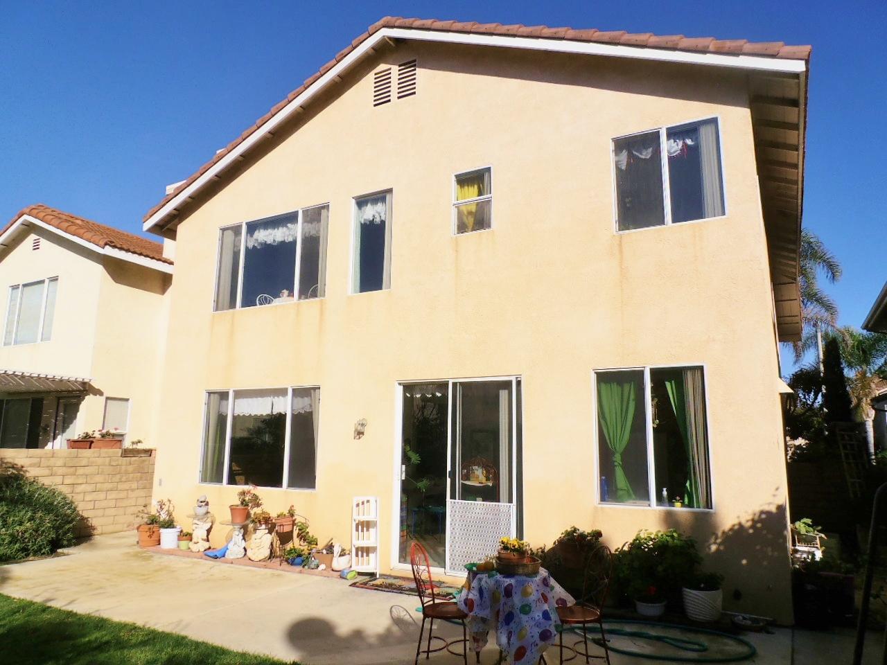 2307 Mint Way Oxnard, CA 93036 - Photo 34 of 39 a front view of a house with yard