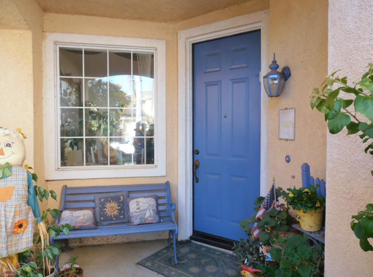 2307 Mint Way Oxnard, CA 93036 - Photo 4 of 39 wooden house with potted plants in front of door