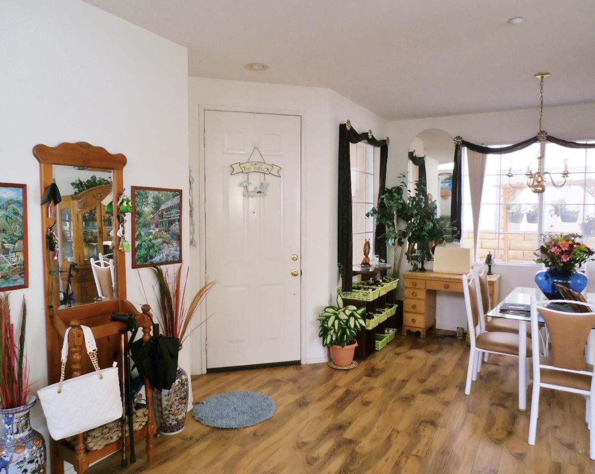 2307 Mint Way Oxnard, CA 93036 - Photo 5 of 39 a view of a livingroom with furniture and a window