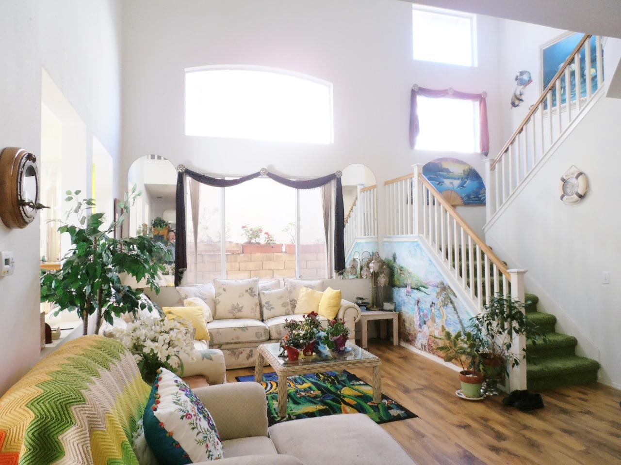 2307 Mint Way Oxnard, CA 93036 - Photo 8 of 39 a living room with furniture and a large window