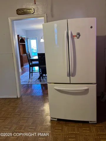 a view of dining room with wooden floor