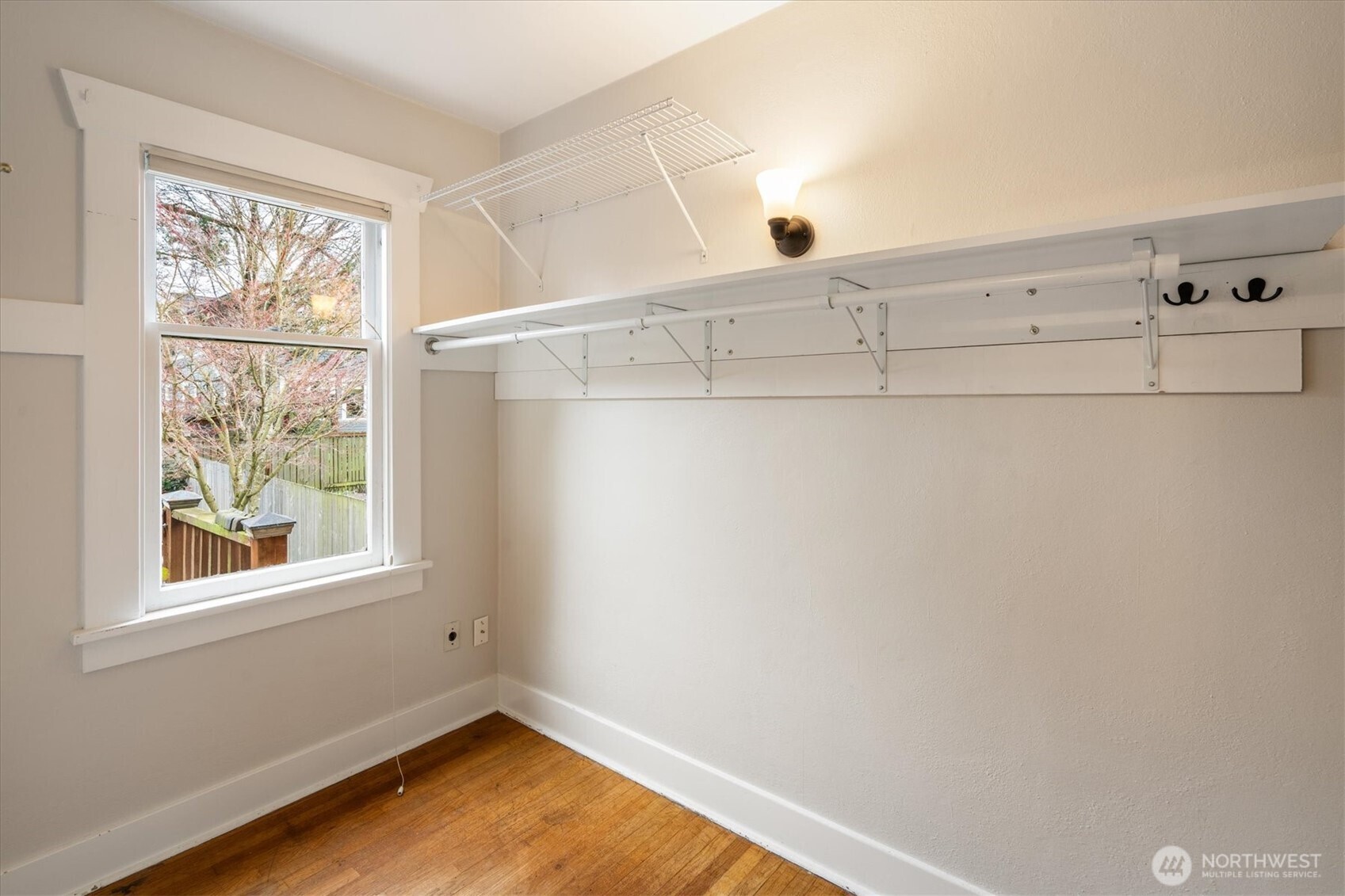 740 North 82nd Street Seattle, WA 98103 - Photo 15 of 36 a view of a room with racks on the wall and a window