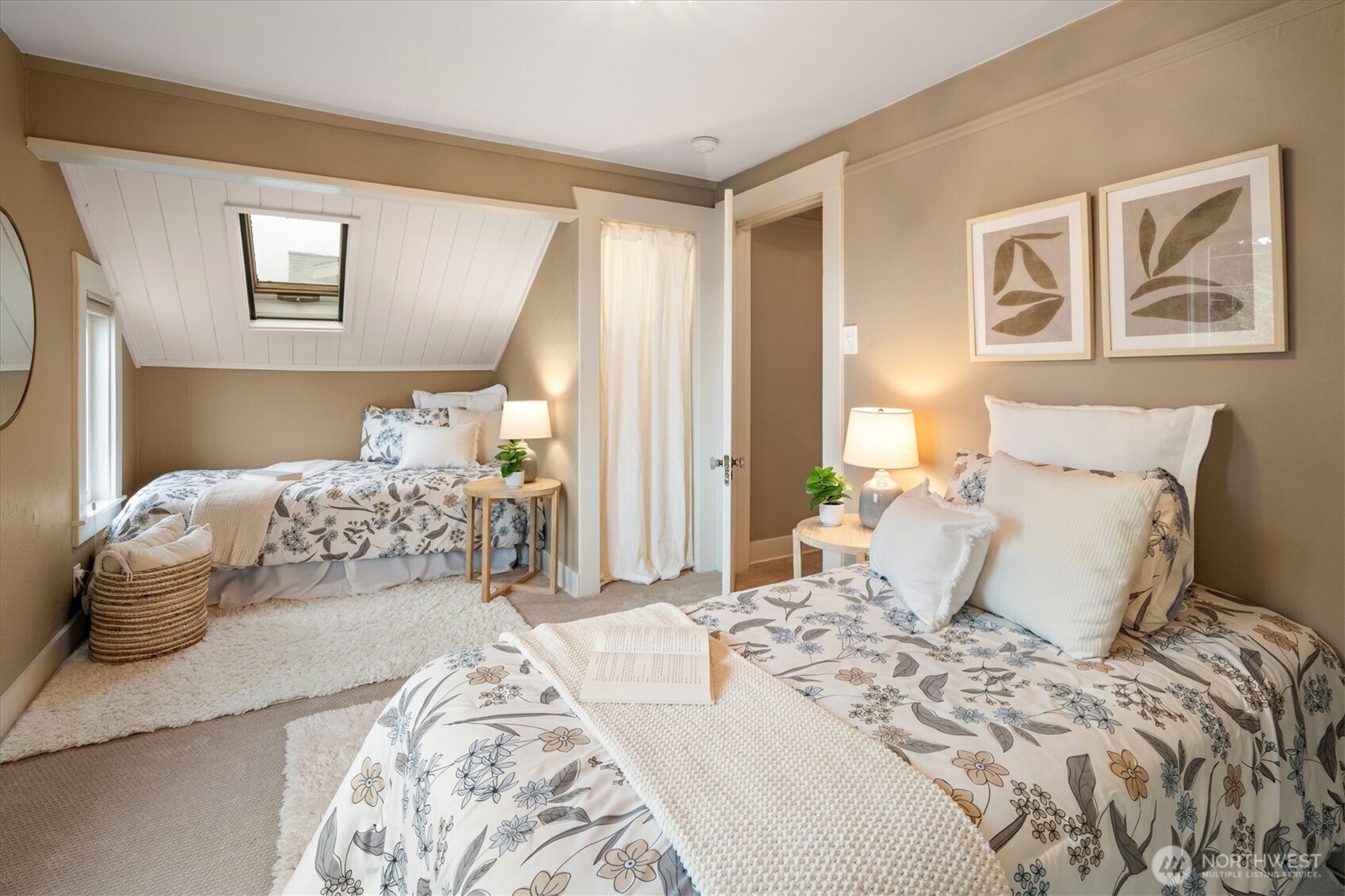 740 North 82nd Street Seattle, WA 98103 - Photo 17 of 36 a bedroom with a large bed and a window