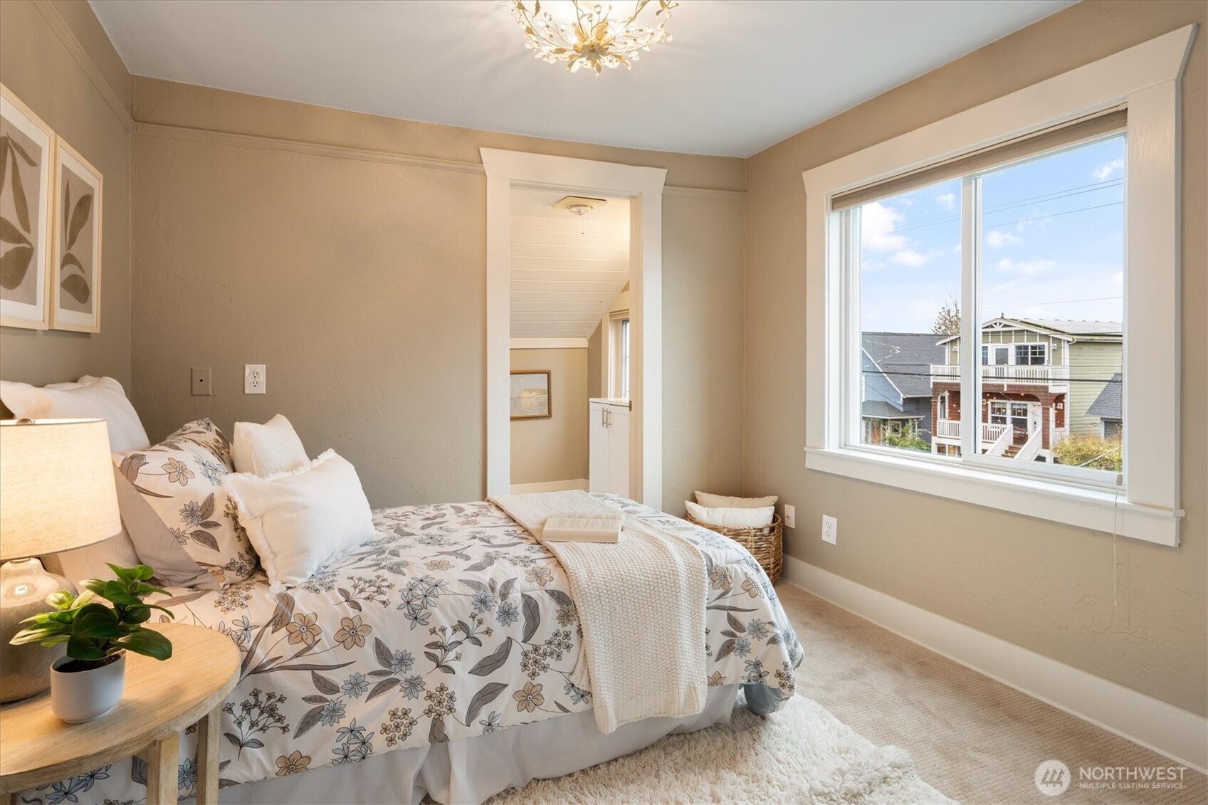 740 North 82nd Street Seattle, WA 98103 - Photo 18 of 36 a bedroom with a bed and a window