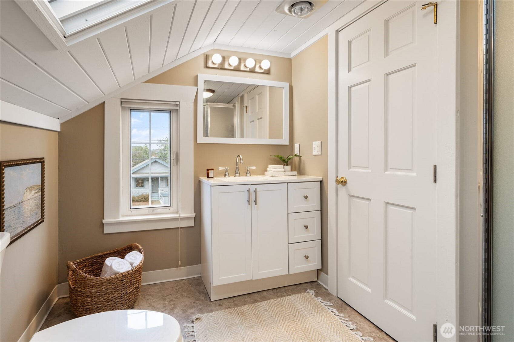 740 North 82nd Street Seattle, WA 98103 - Photo 19 of 36 a view of a bathroom with dual sinks