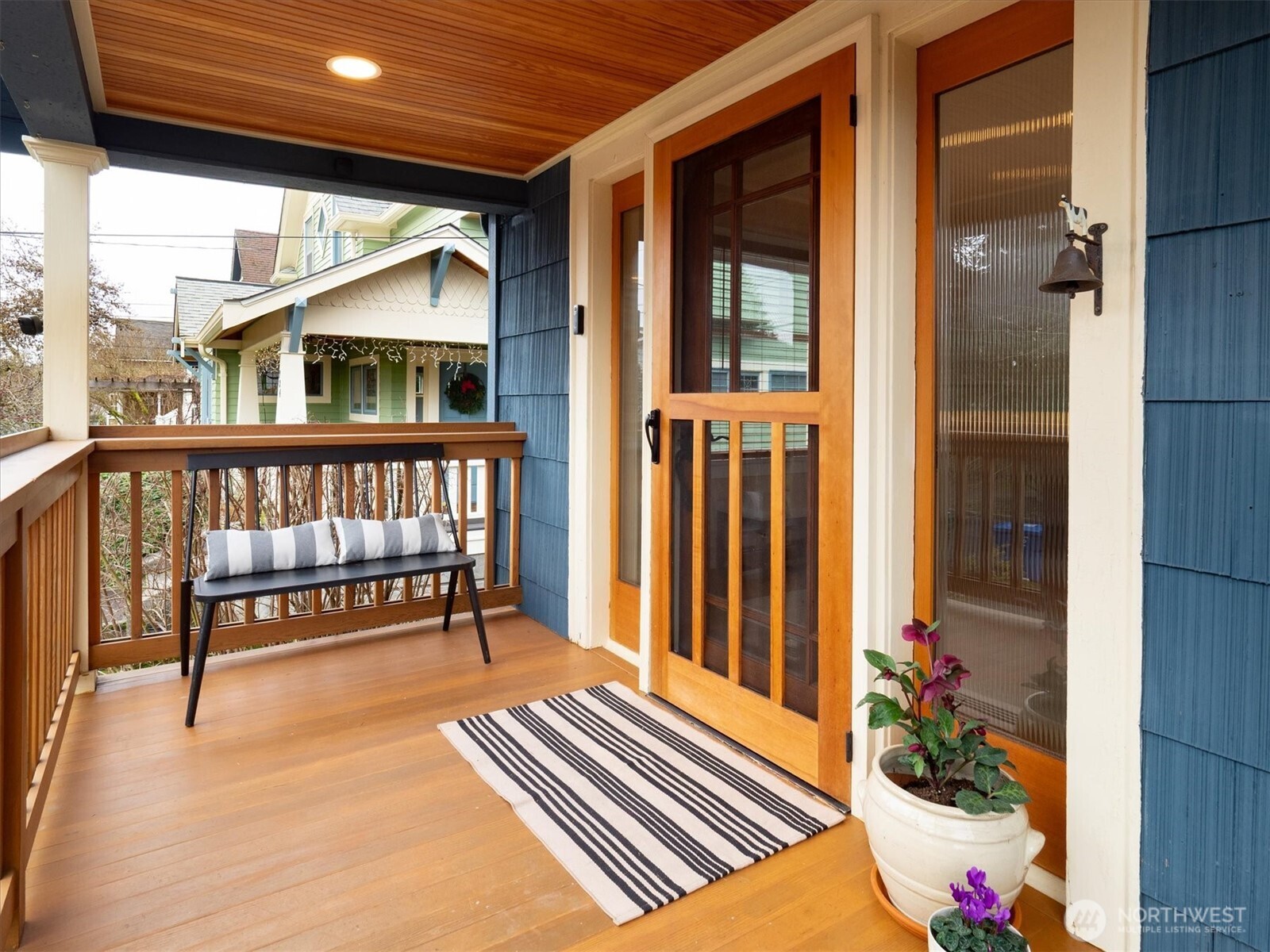 740 North 82nd Street Seattle, WA 98103 - Photo 2 of 36 a view of a balcony with a potted plant