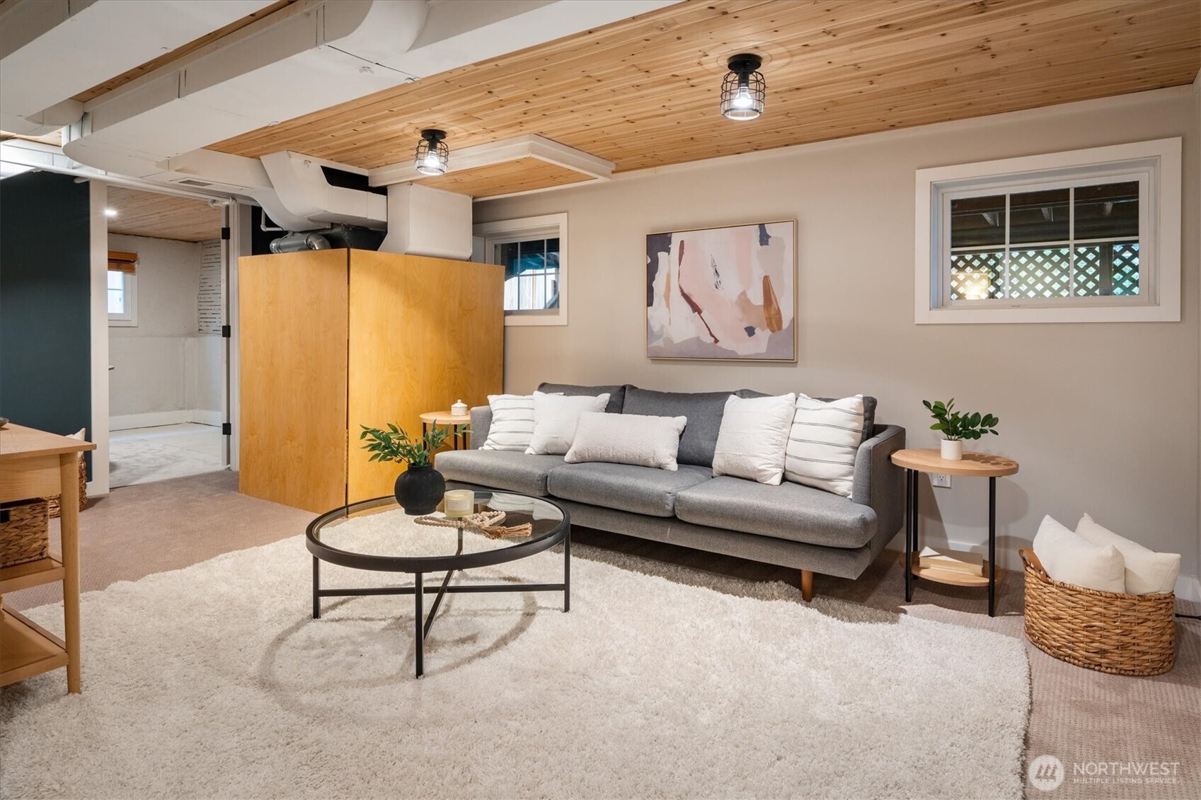 740 North 82nd Street Seattle, WA 98103 - Photo 21 of 36 a living room with furniture and a window