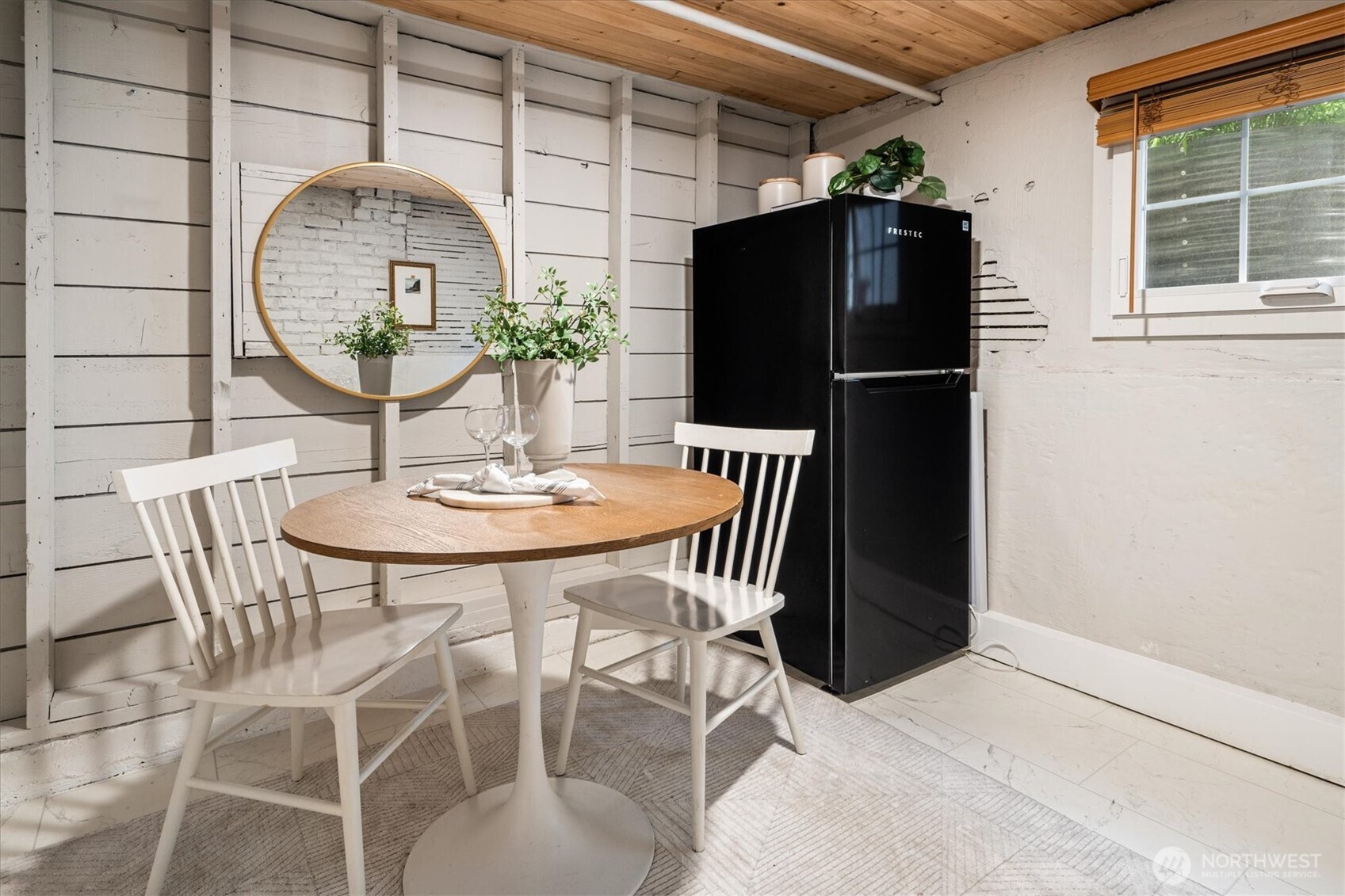 740 North 82nd Street Seattle, WA 98103 - Photo 24 of 36 a table and chairs in a patio