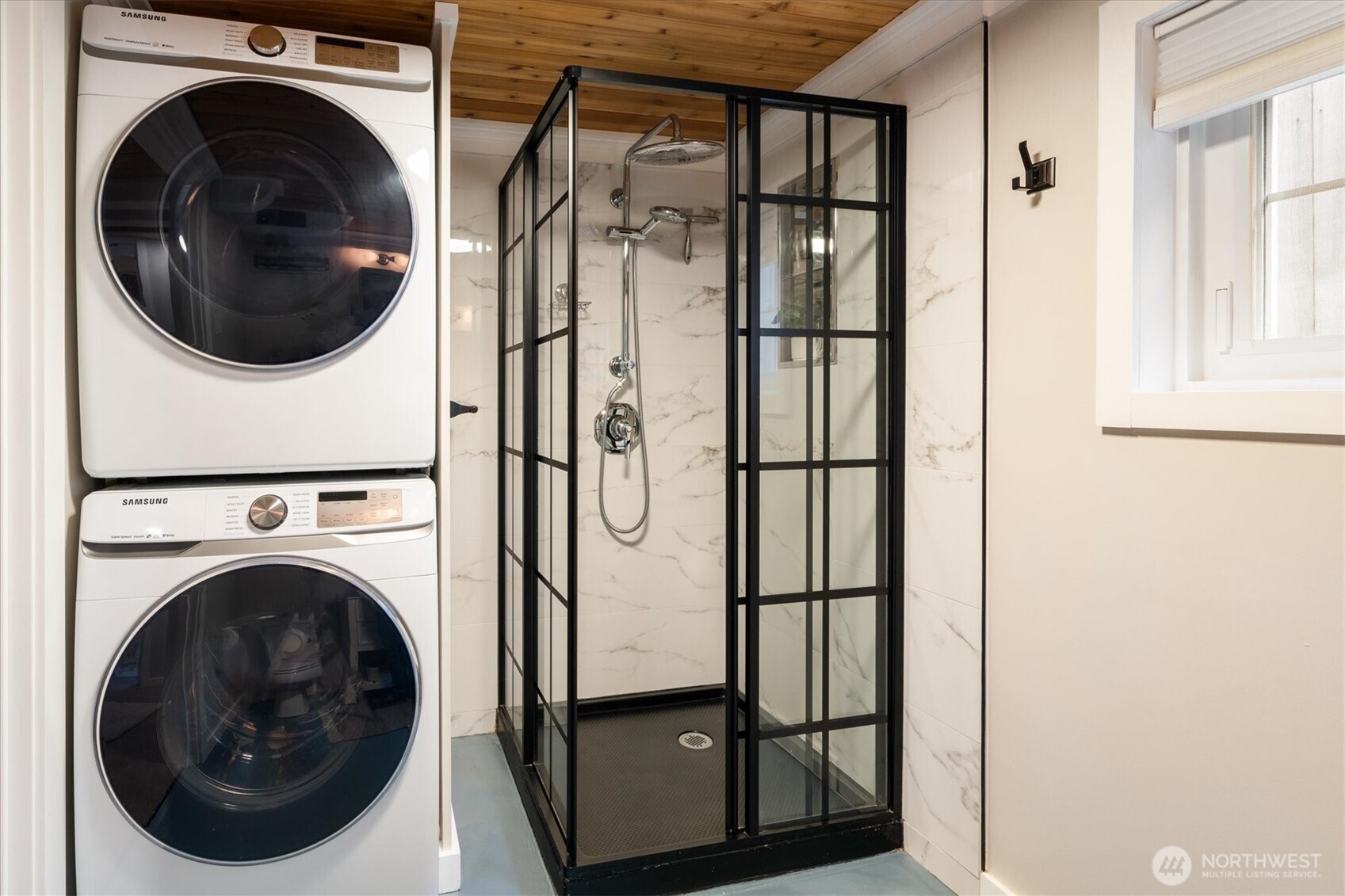 740 North 82nd Street Seattle, WA 98103 - Photo 26 of 36 a view of a hallway with washer and dryer
