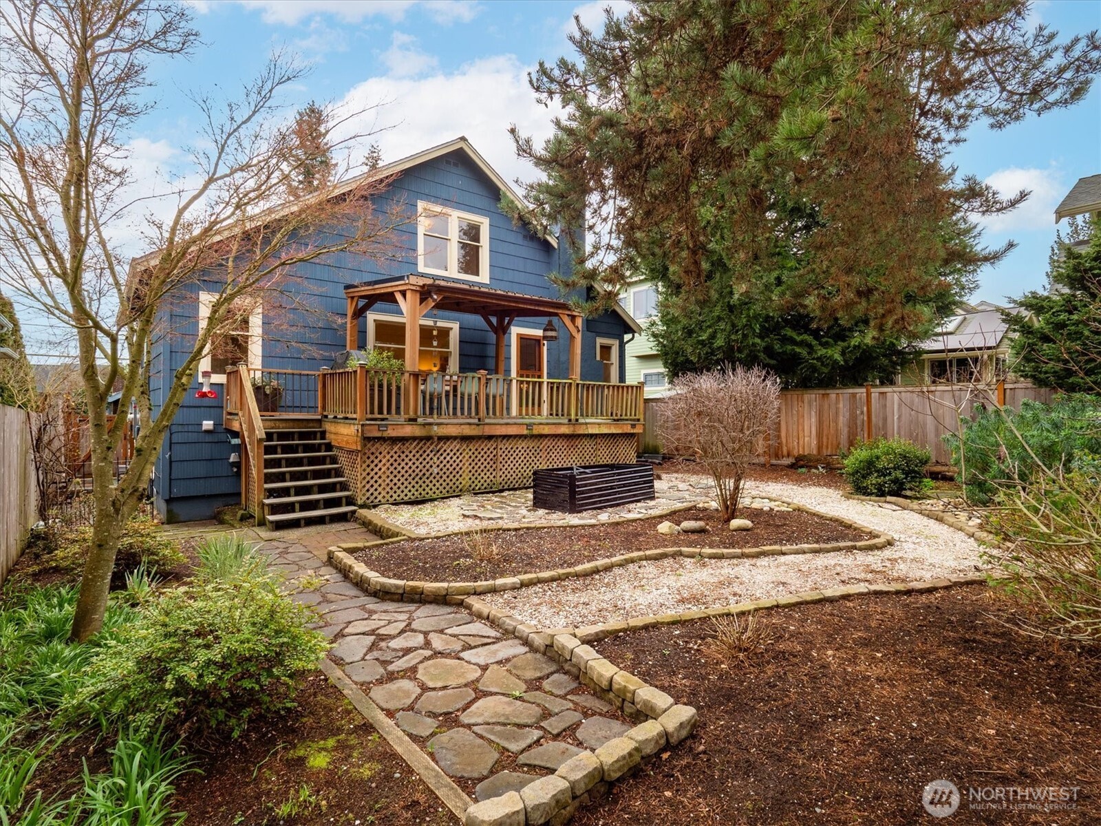 740 North 82nd Street Seattle, WA 98103 - Photo 27 of 36 a front view of a house with a yard