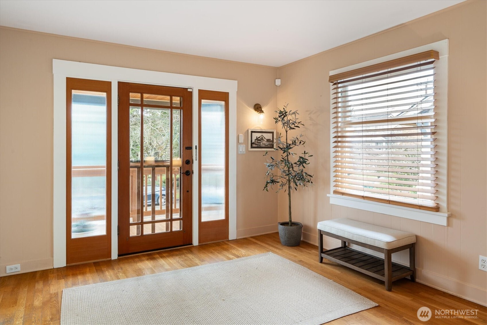 740 North 82nd Street Seattle, WA 98103 - Photo 3 of 36 a living room with furniture and a window