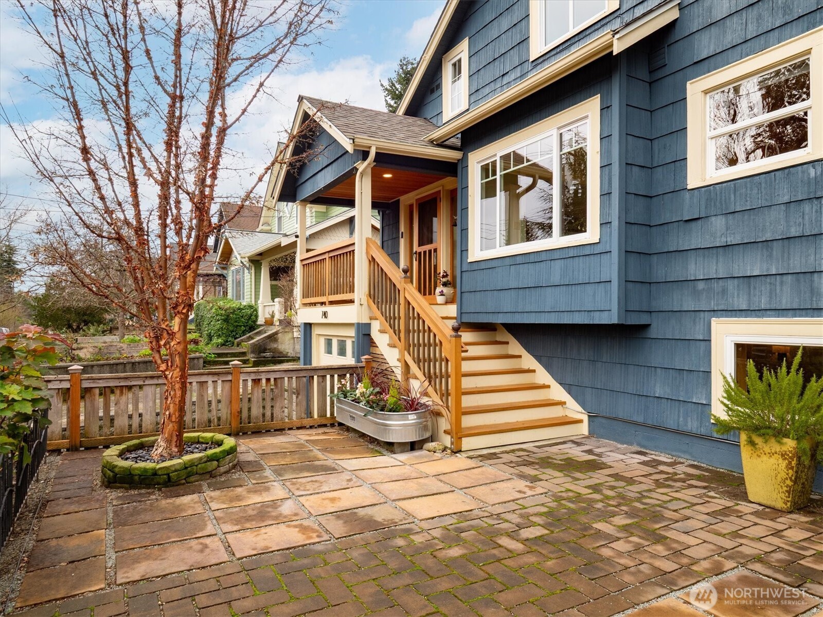 740 North 82nd Street Seattle, WA 98103 - Photo 31 of 36 a front view of a house with a yard