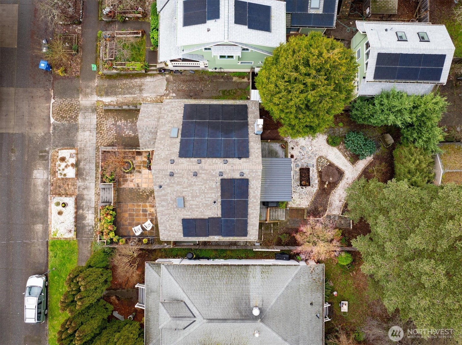 740 North 82nd Street Seattle, WA 98103 - Photo 33 of 36 a aerial view of a house with a yard and large trees