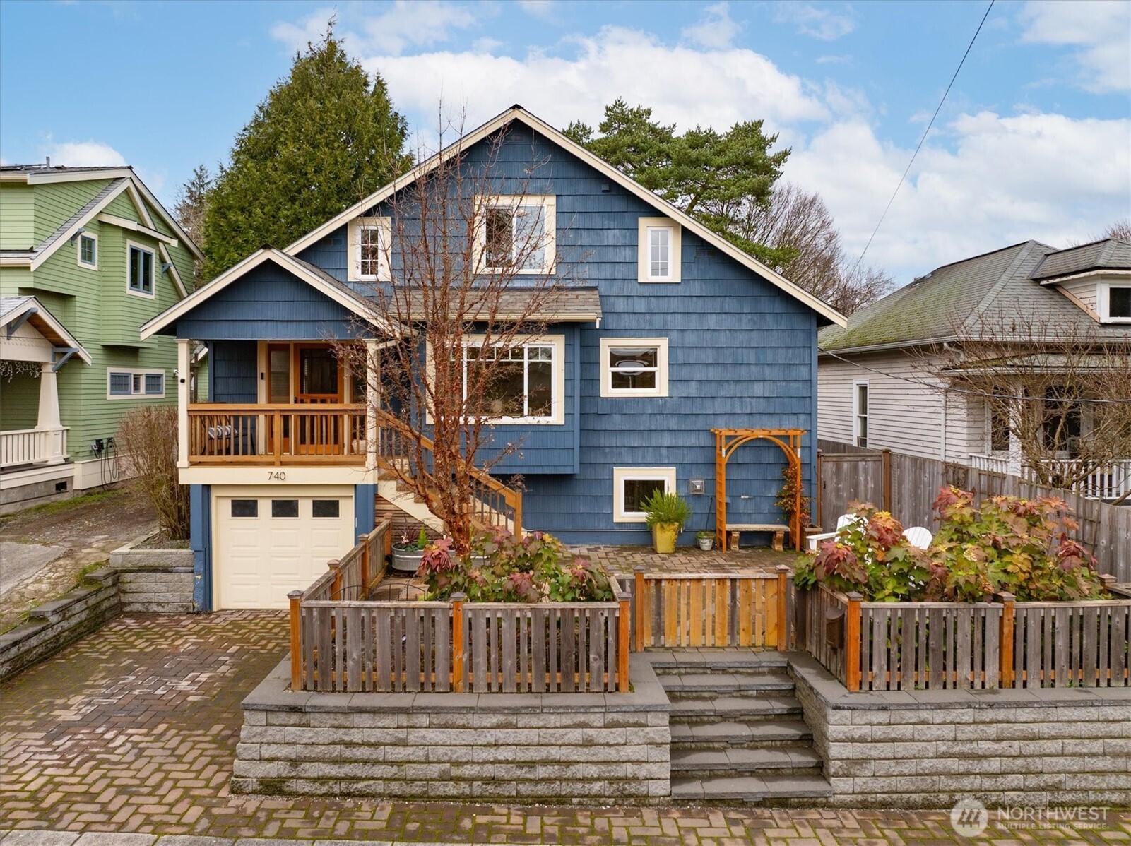 740 North 82nd Street Seattle, WA 98103 - Photo 36 of 36 a front view of a house with garden