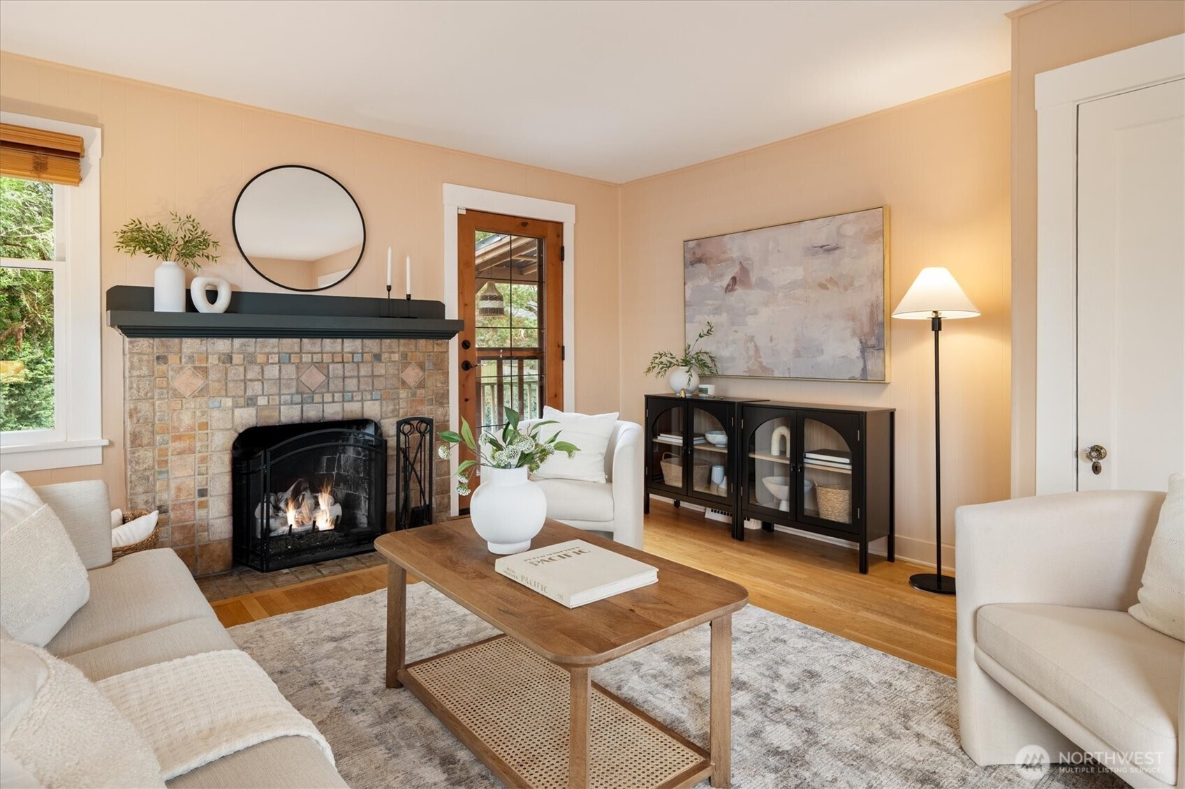 740 North 82nd Street Seattle, WA 98103 - Photo 4 of 36 a living room with furniture and a fireplace