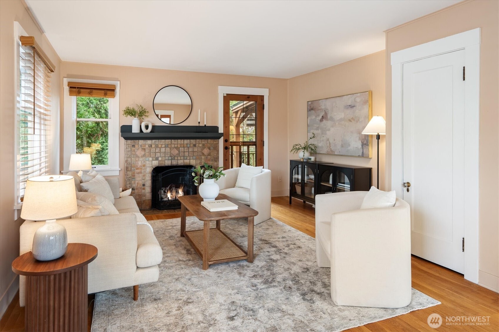 740 North 82nd Street Seattle, WA 98103 - Photo 5 of 36 a living room with furniture and a fireplace