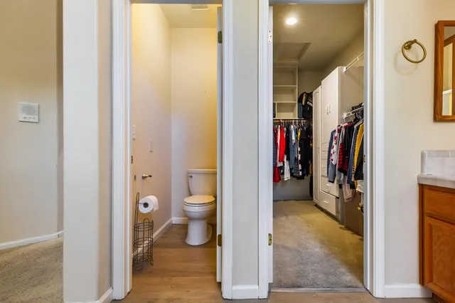 a bathroom with a vanity a sink and a mirror