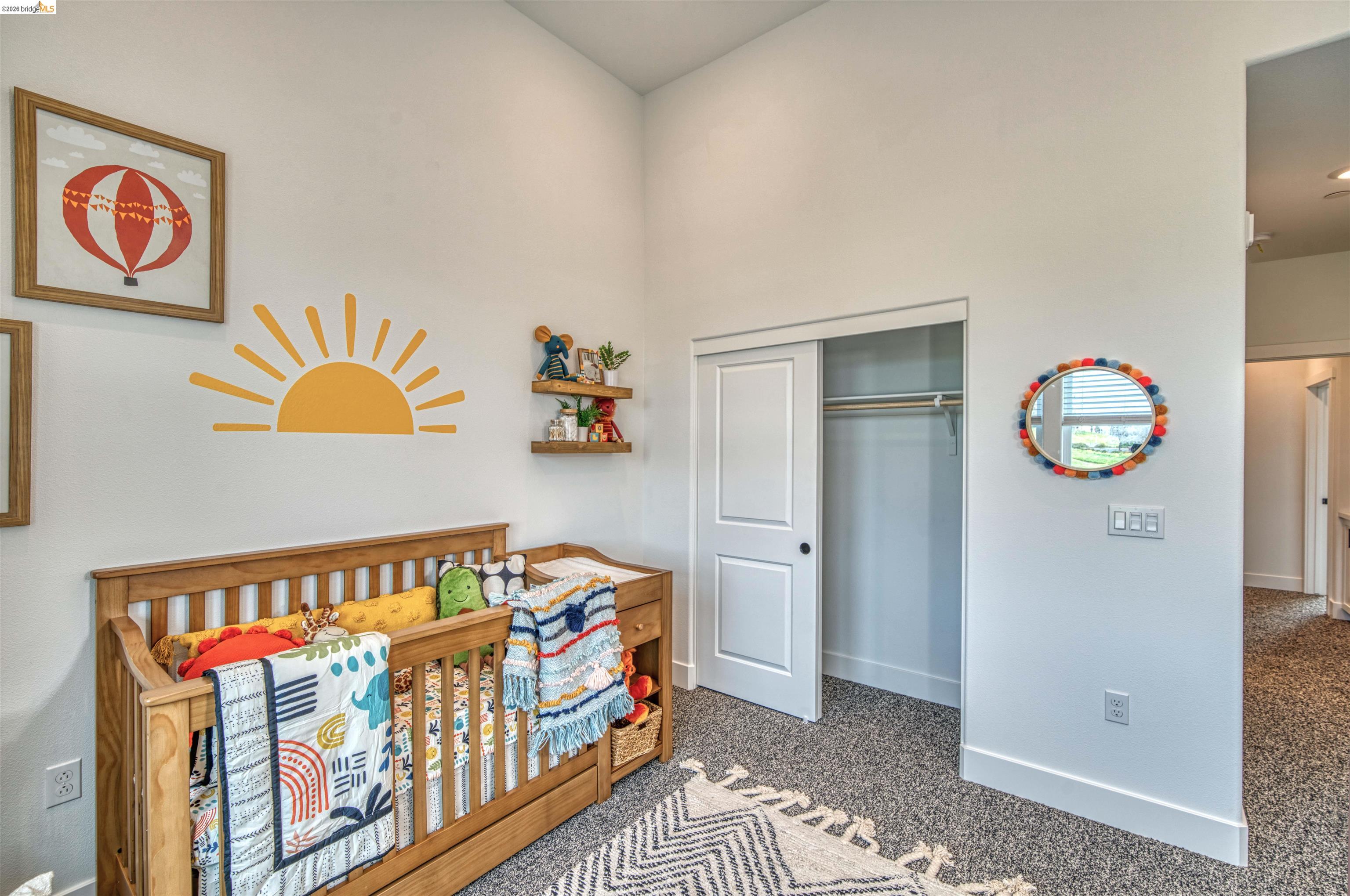 28951 Parkridge Loop, Unit 87 Hayward, CA 94544 - Photo 15 of 23 a bedroom with a bed and wooden floor