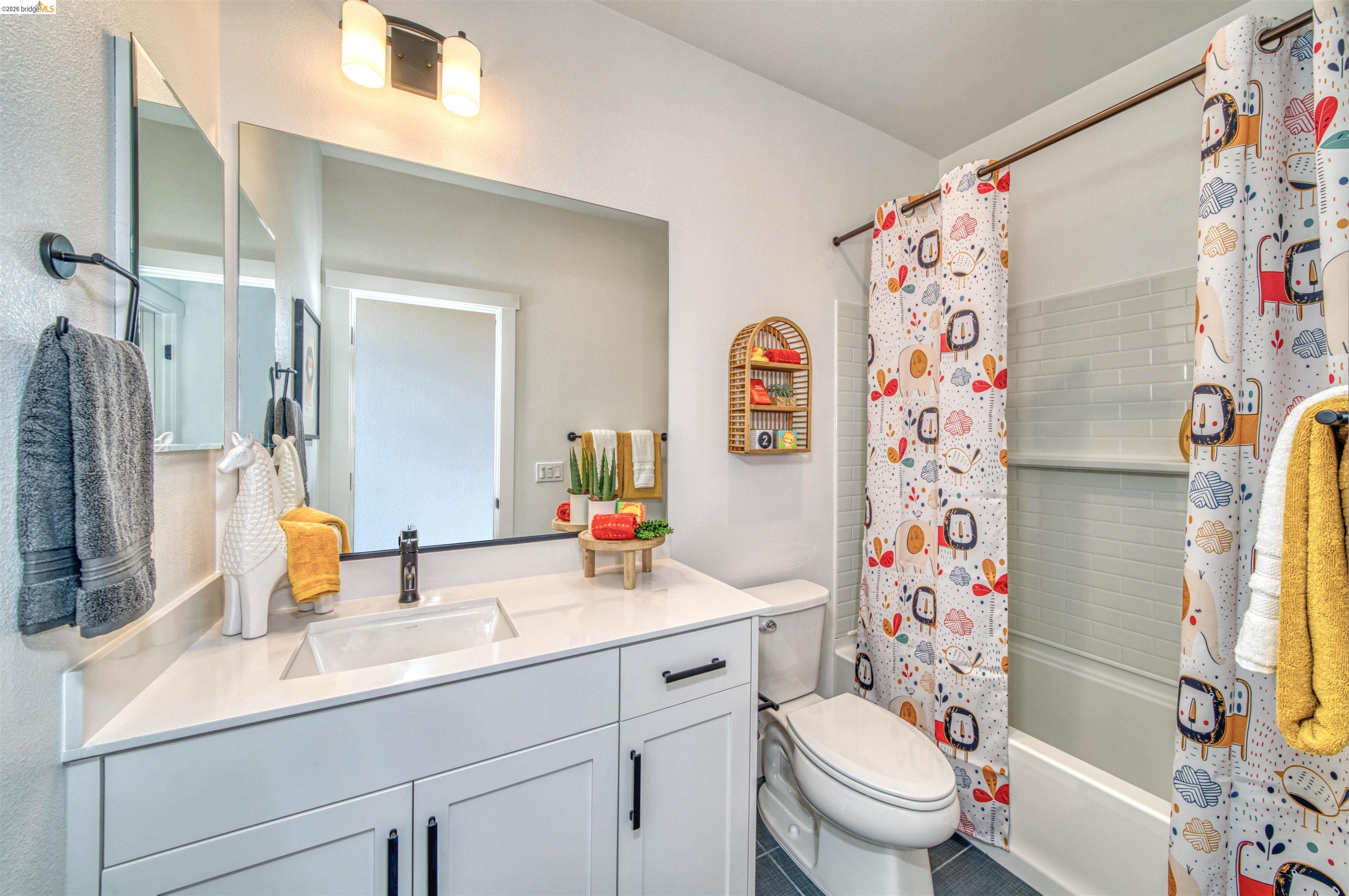 28951 Parkridge Loop, Unit 87 Hayward, CA 94544 - Photo 16 of 23 a bathroom with a sink toilet and shower