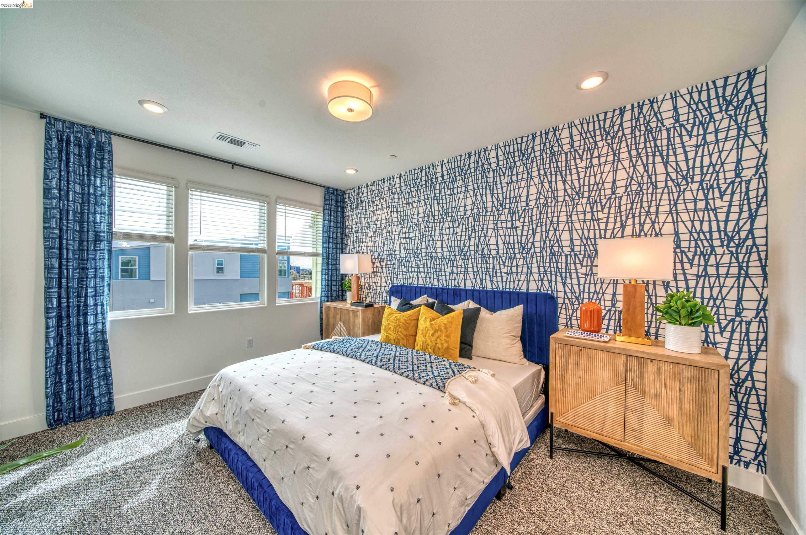 28951 Parkridge Loop, Unit 87 Hayward, CA 94544 - Photo 17 of 23 a bedroom with a bed and a window