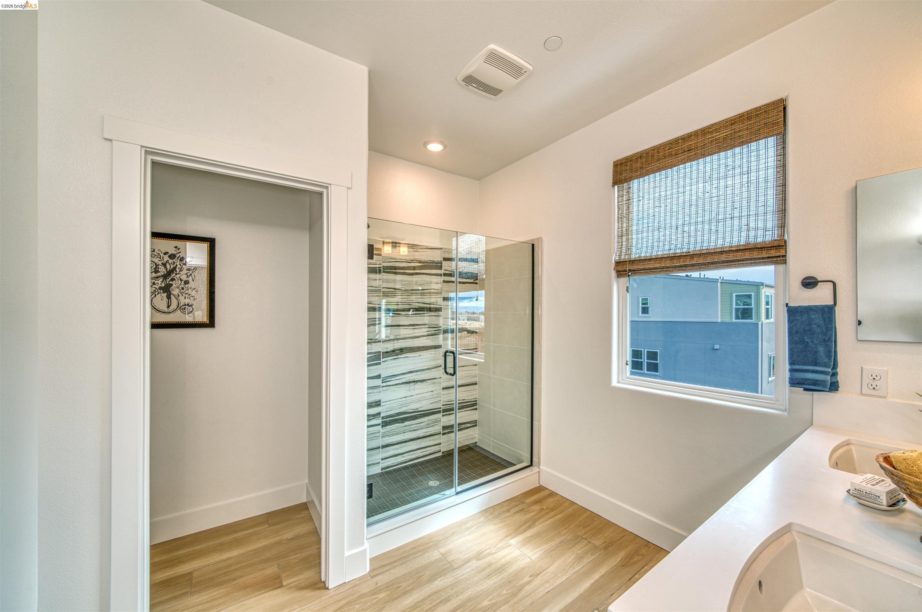 28951 Parkridge Loop, Unit 87 Hayward, CA 94544 - Photo 22 of 23 a view of an empty room with wooden floor and a window