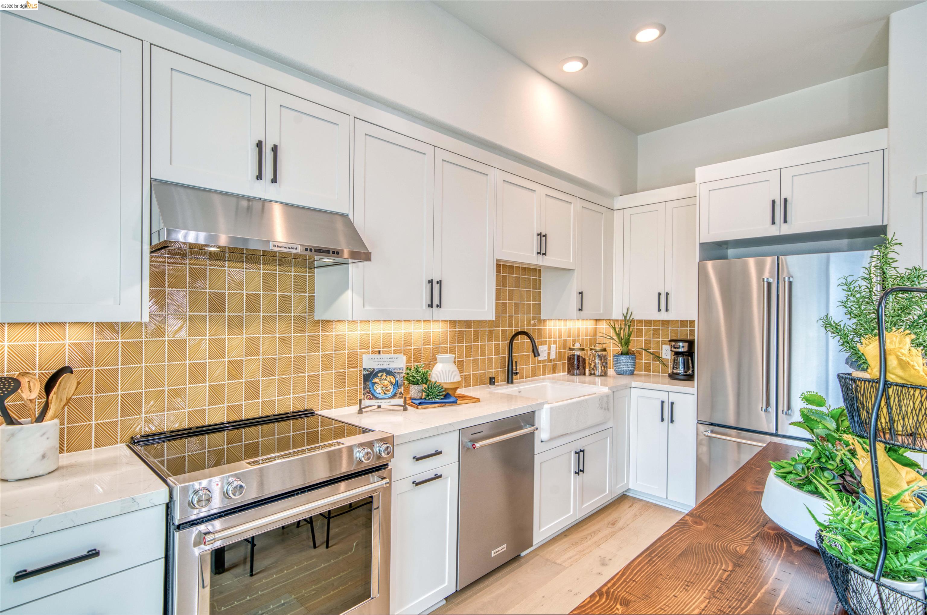 28951 Parkridge Loop, Unit 87 Hayward, CA 94544 - Photo 7 of 23 a kitchen with white cabinets and white appliances