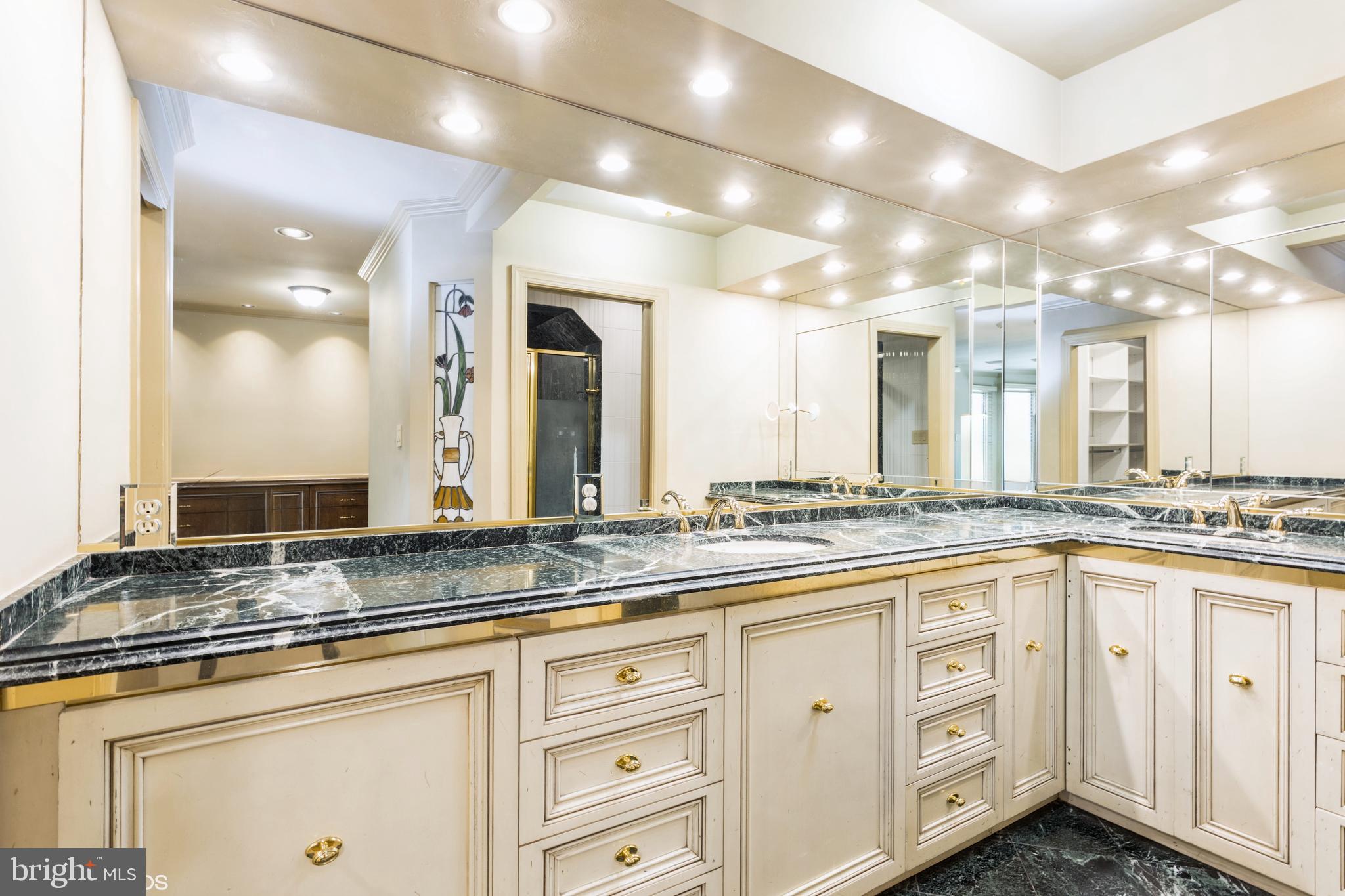7920 Long Meadow Road Baltimore, MD 21208 - Photo 23 of 40 a kitchen with lots of counter space and a sink