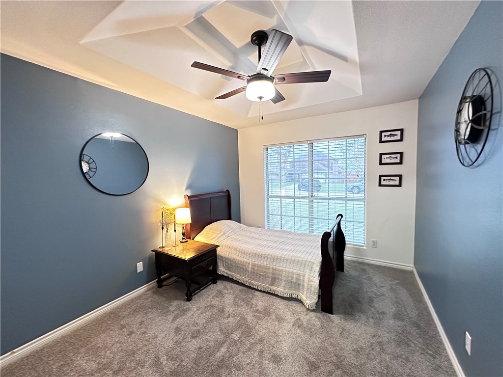 2106 Brook Lane Kingsville, TX 78363 - Photo 30 of 38 a living room with a bed furniture and a large window